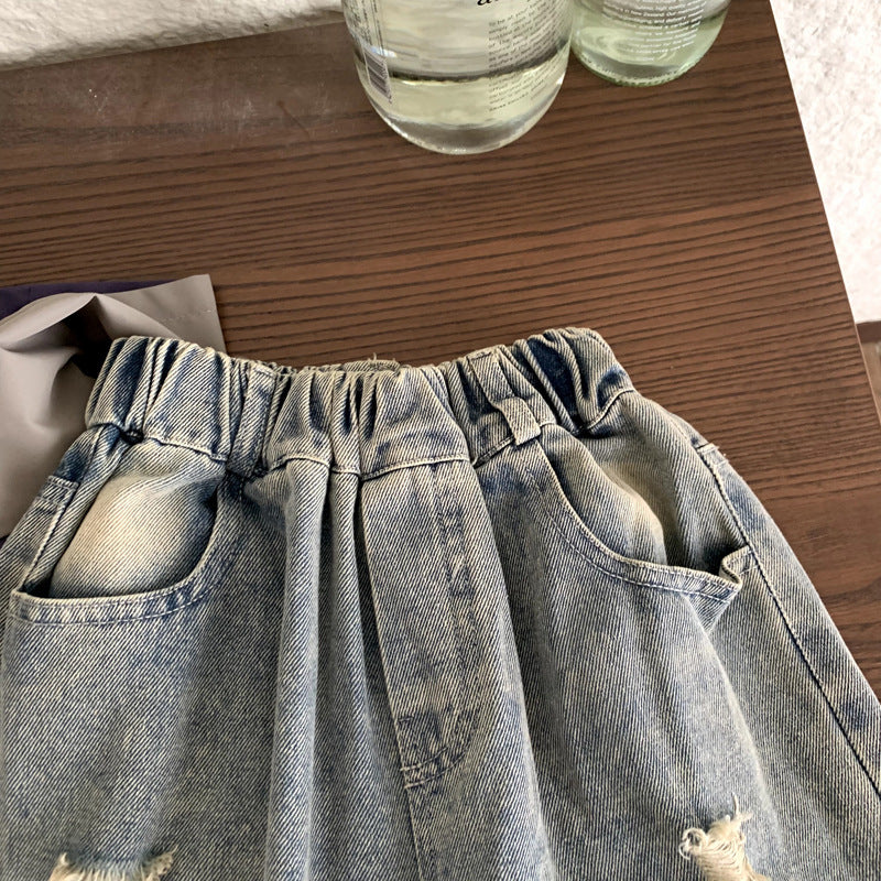 Zerrissene Jeans für Jungen und Mädchen